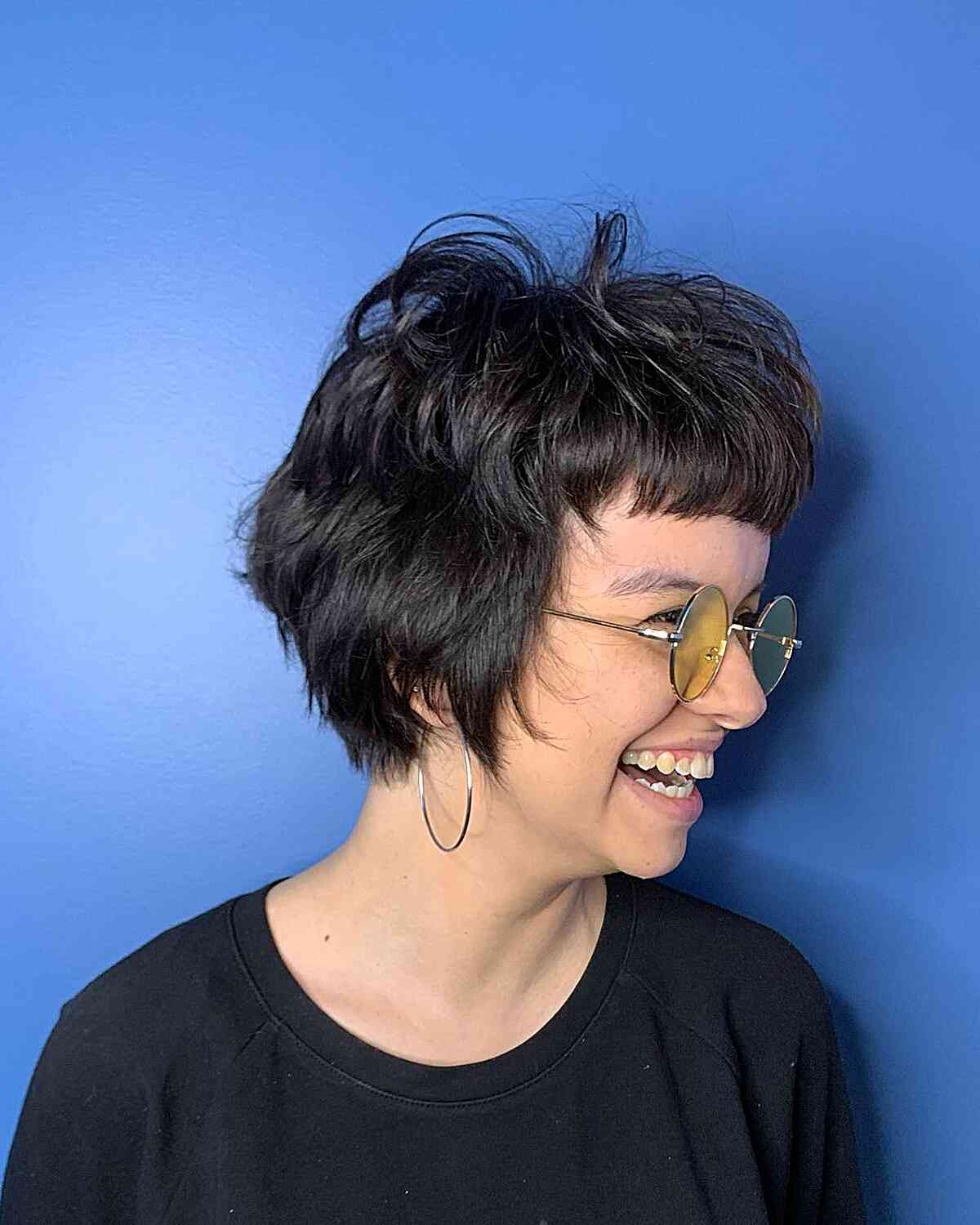 Jaw-Length Short Crop with Choppy Disconnected Layers and Short Bangs for Dark Hair