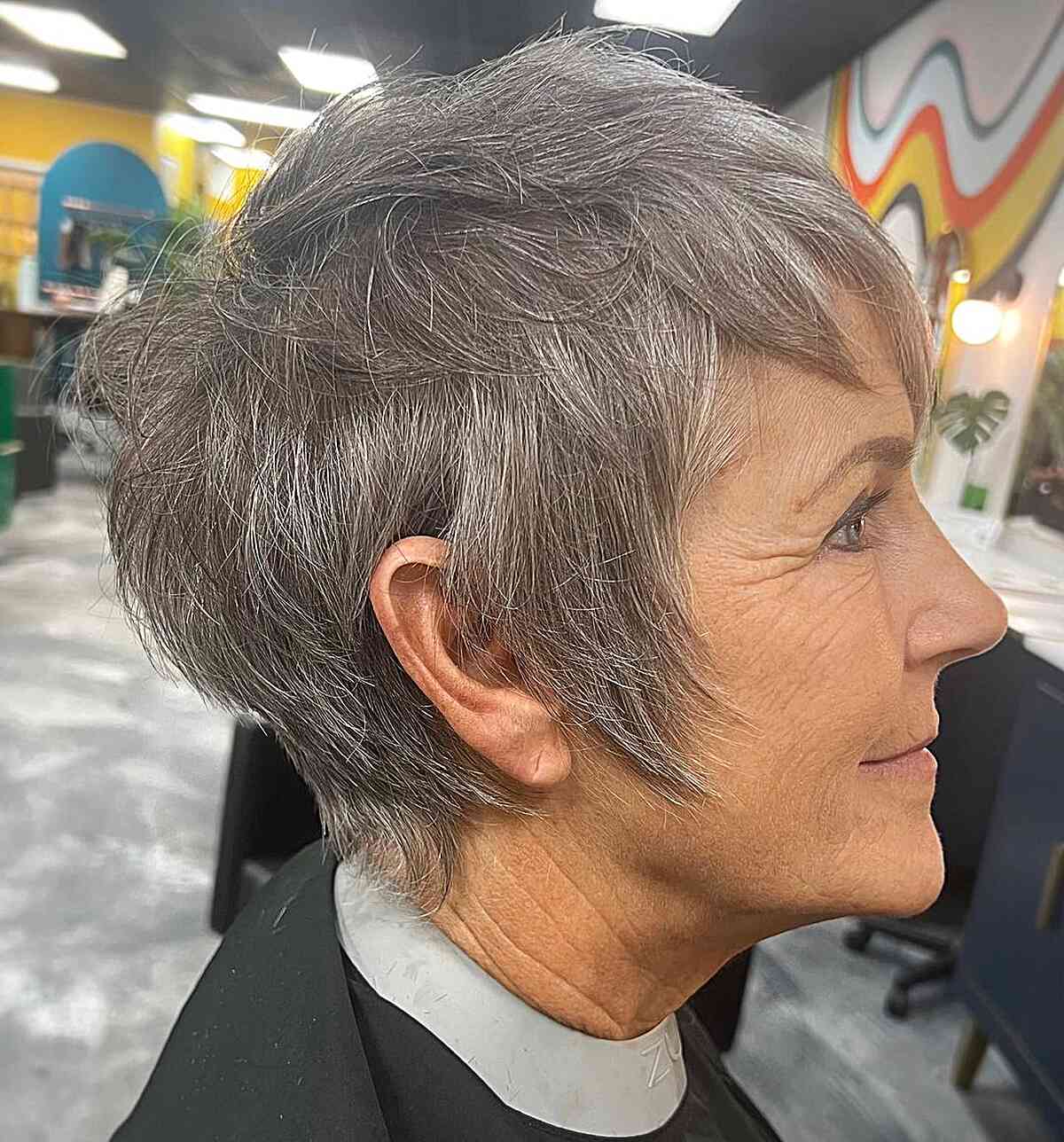 Jaw-Length Tousled Razor Cut Pixie with Layers on Senior Women's Grey Hair