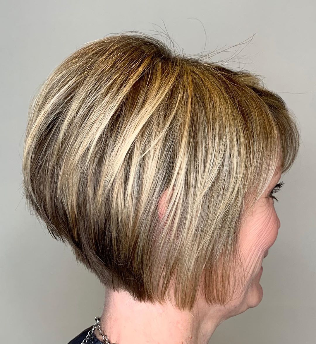 Jaw-Length Wedge Cut with Blonde Highlights