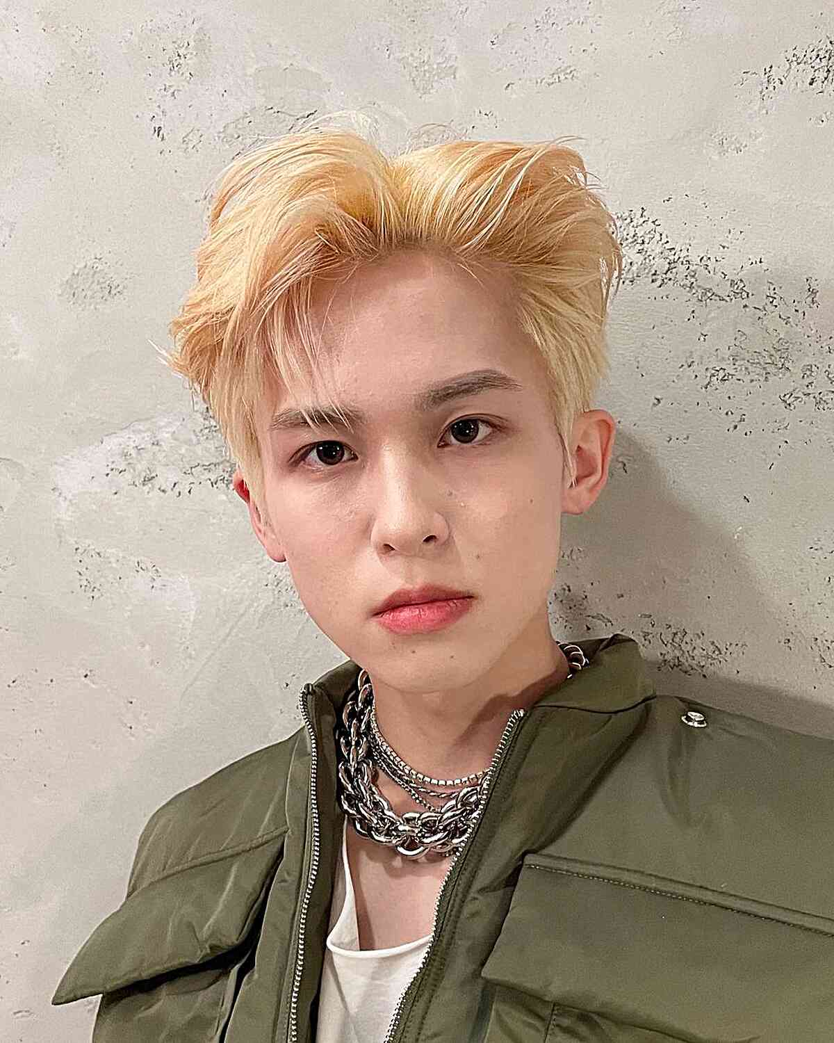 Kpop Flowy Hairstyle with Blown Back Bangs for Young Guys with Blonde Hair