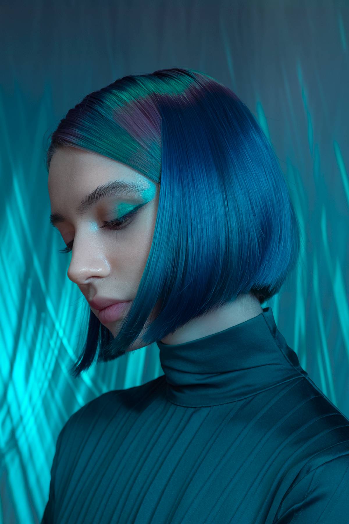 Labradorite luxe bob featuring iridescent navy, teal, and violet hues for a gemstone-like shimmer