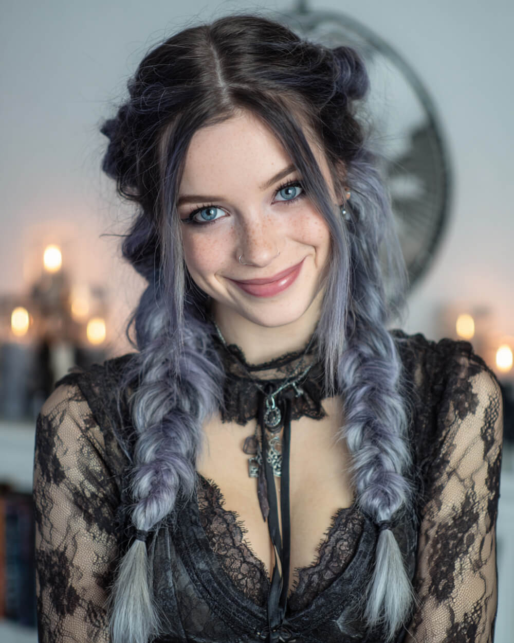 Lavender twin braids with space buns, playful Halloween hairstyle with fantasy color