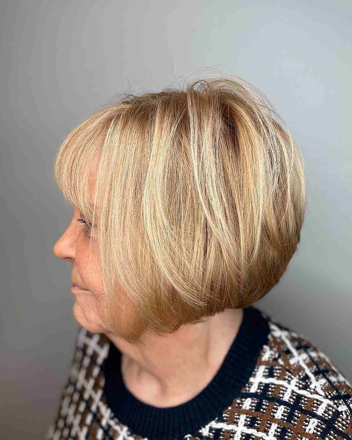Layered and Graduated Bob with Bangs for Old Women
