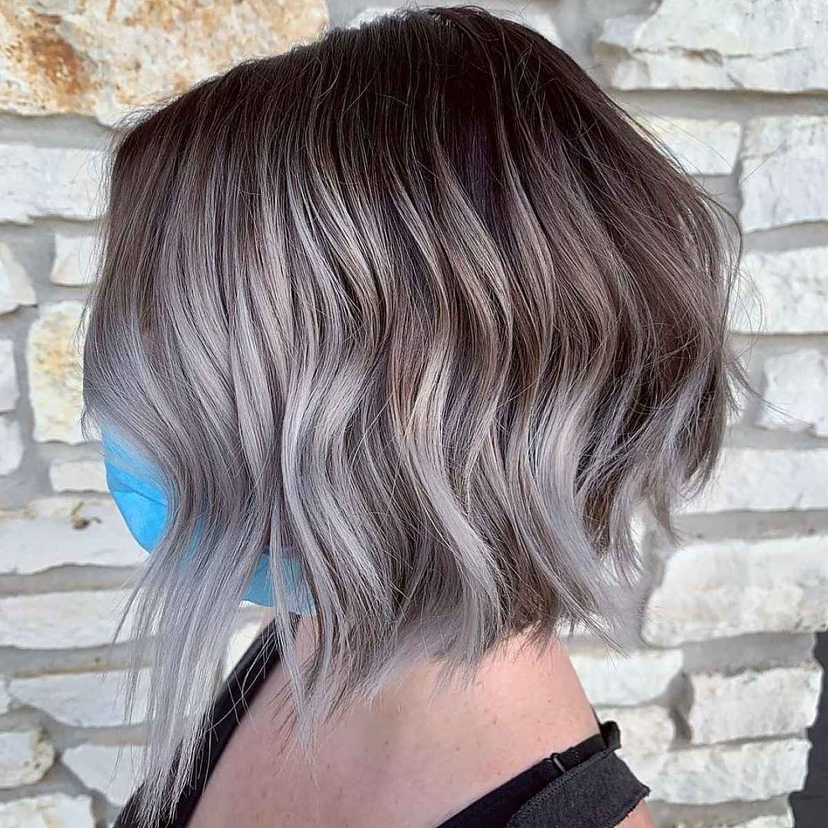 Layered and Inverted Wavy Bob with a Silver Balayage
