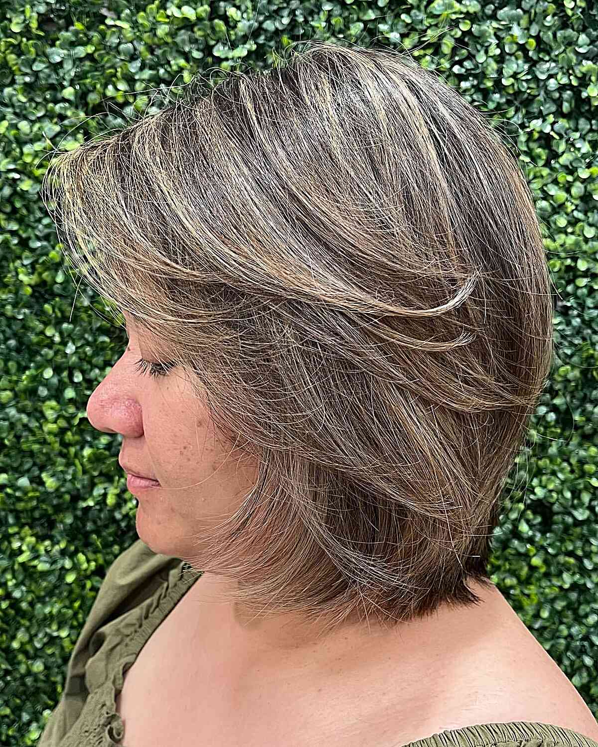 Layered Bangs and Blonde Highlights on Butterfly Short Bobbed Hair