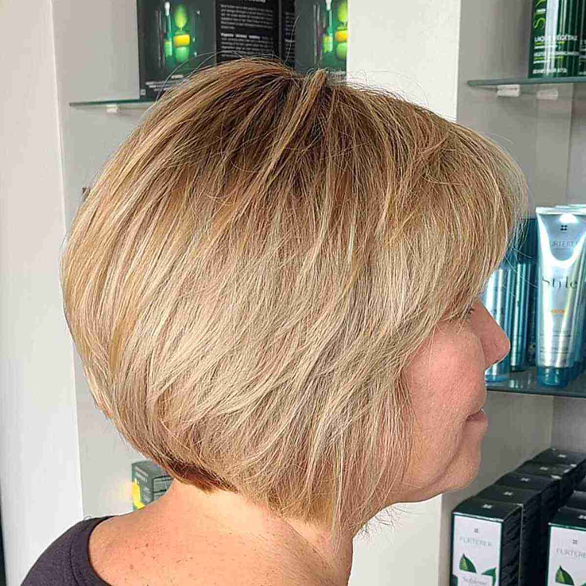 Layered Blonde Graduated Bob with a Fringe for Women Over Fifty