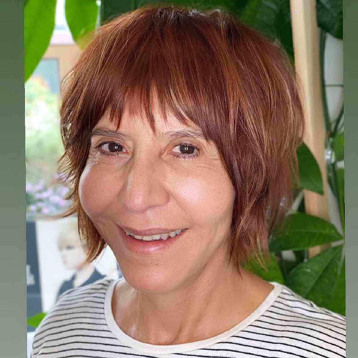 Layered Bob Cut with Textured Bangs Over 50