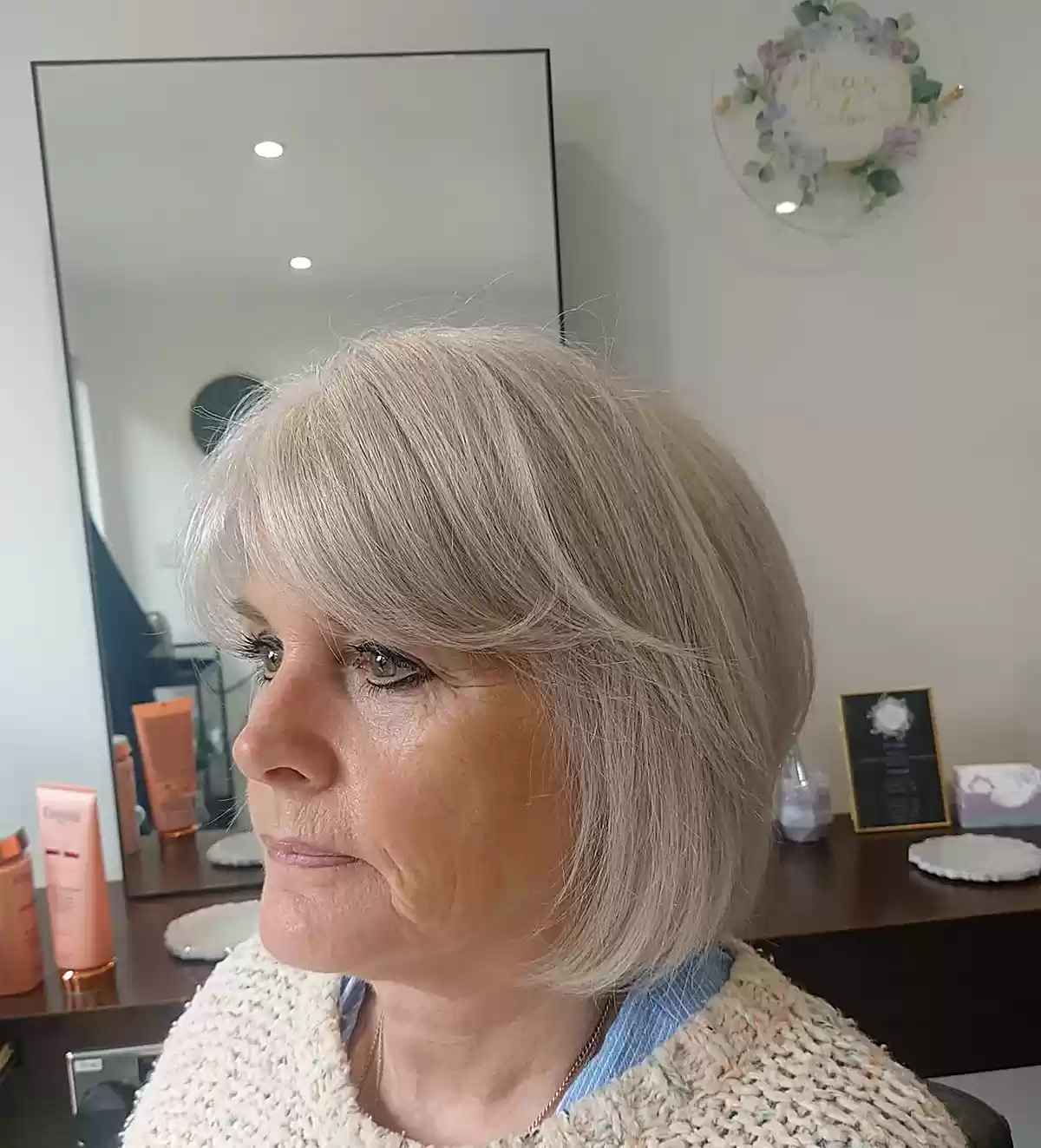 Layered Bob with White Blend Regrowth and Bangs for older women
