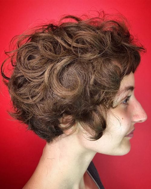 Layered curly bob with light bangs