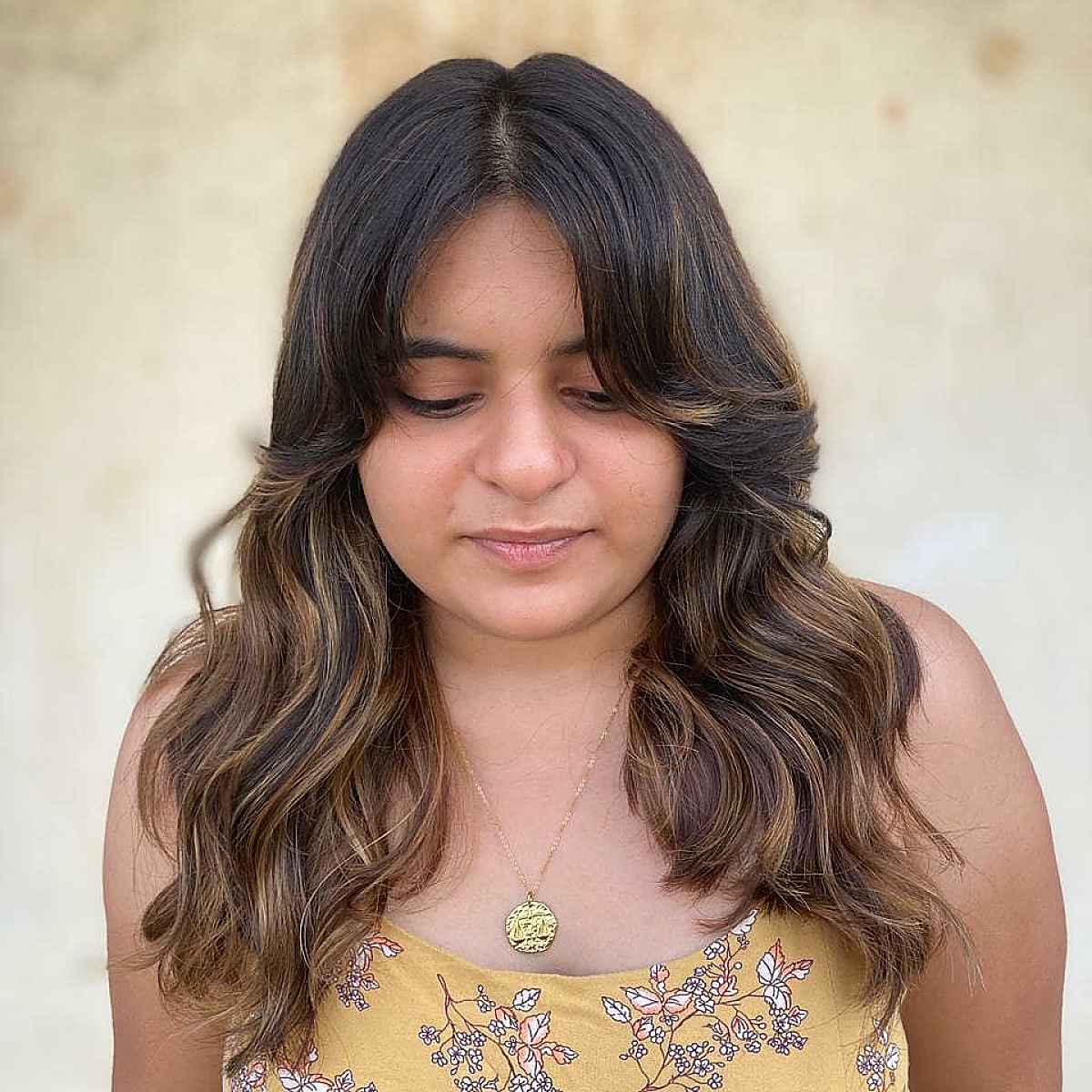 Layered Curtain Bangs Hairstyle for Round Faces