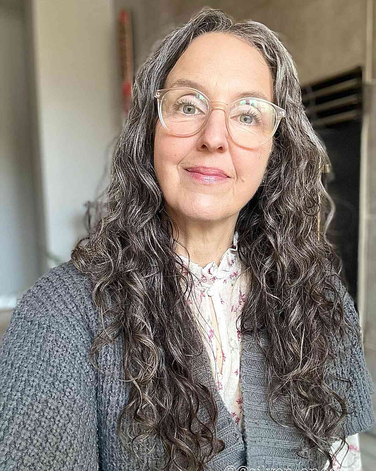 Layered Cut for Very Long Curls on Women Over Sixty with Glasses