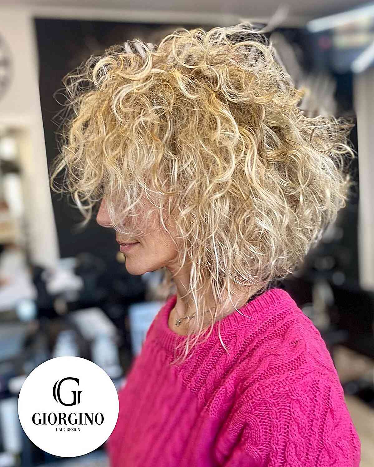 Layered Inverted Choppy Lob Cut with Messy Curls