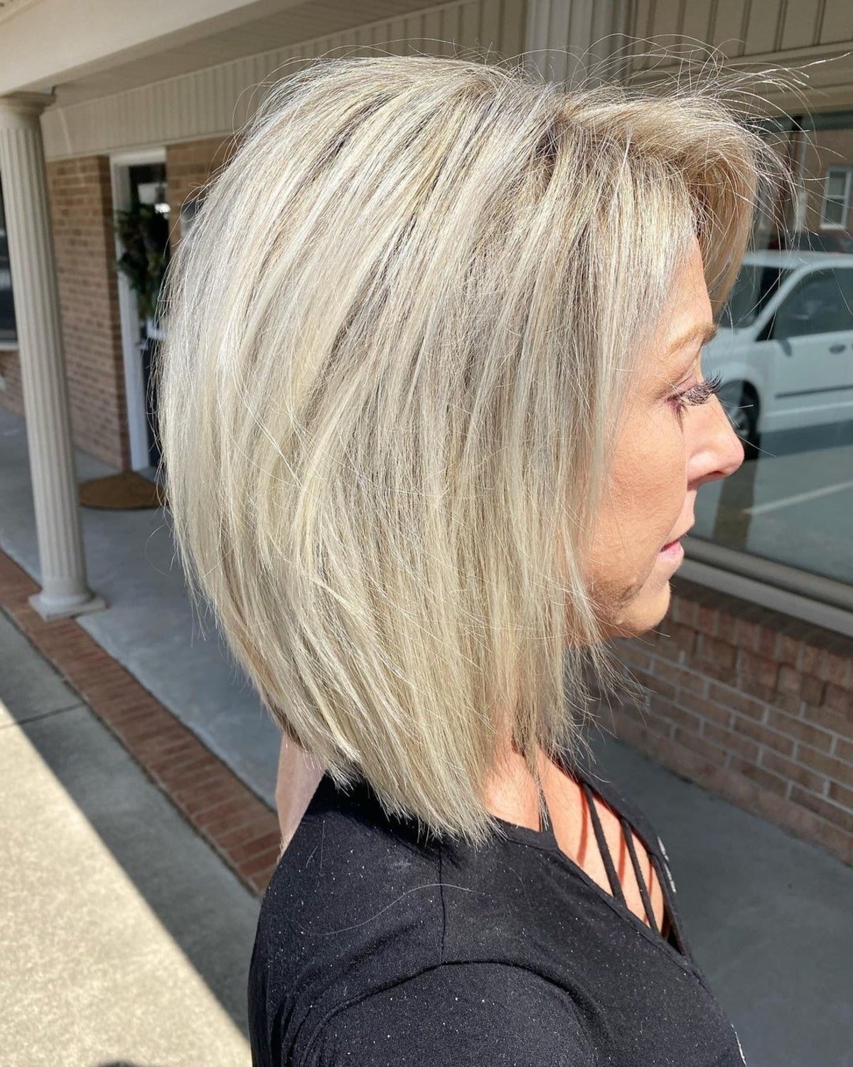 Mature layered lob with razored layers for thick tresses