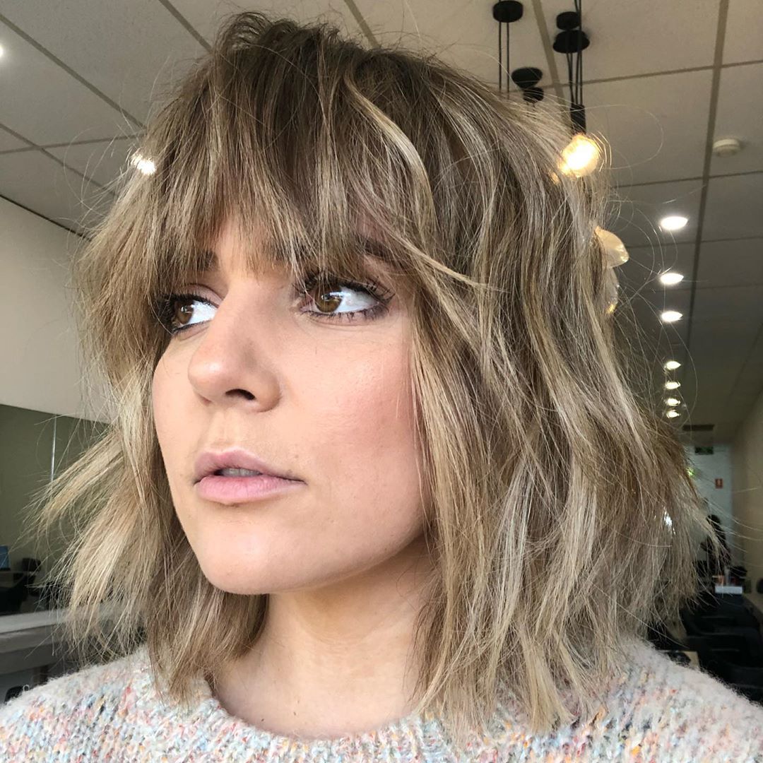 messy layered lob with very long bangs for fine hair