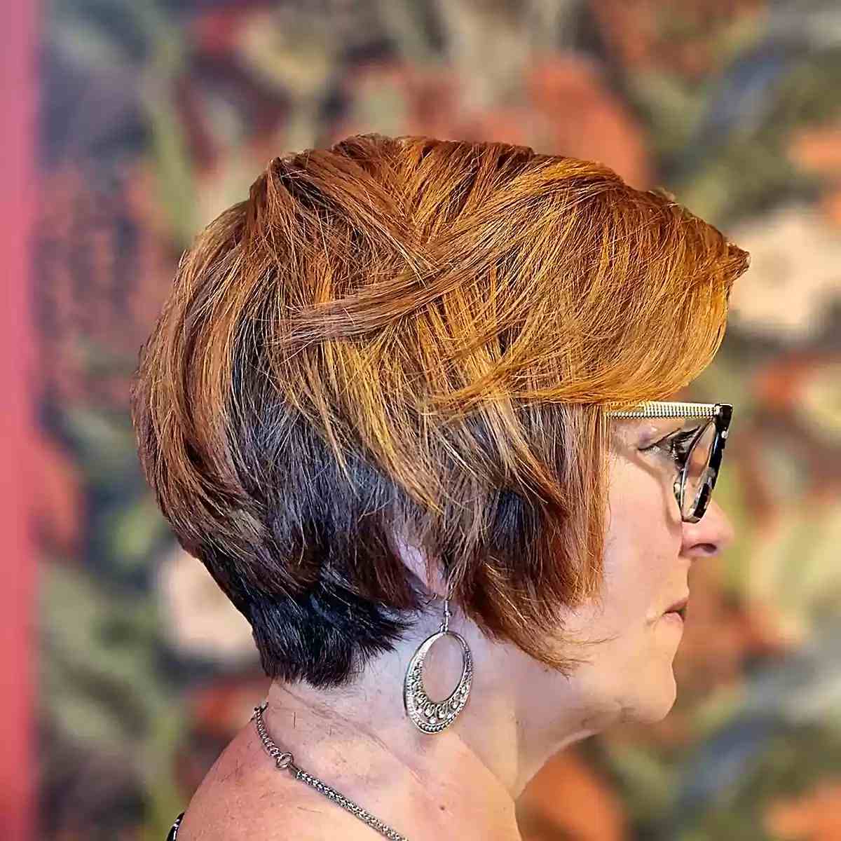 Layered Long Pixie with Copper Highlights for Women Over 70 with Glasses