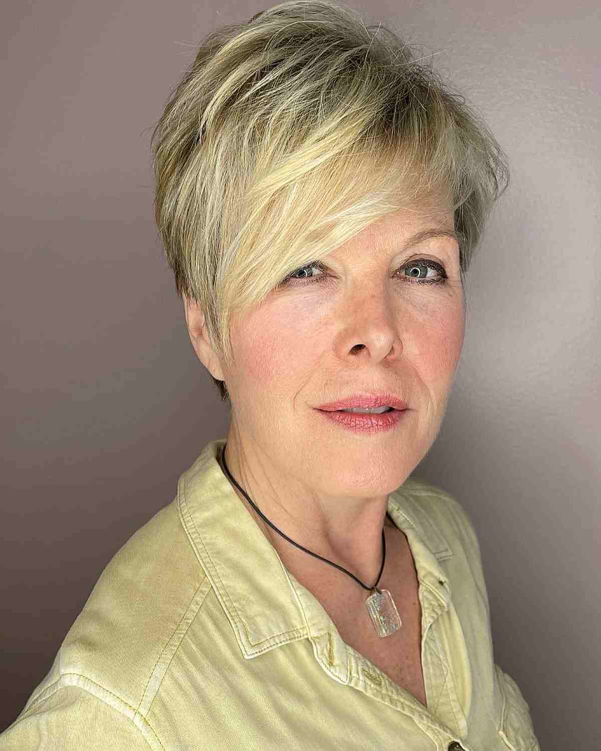 Layered Pixie with Long Side Bangs for Women Over 50