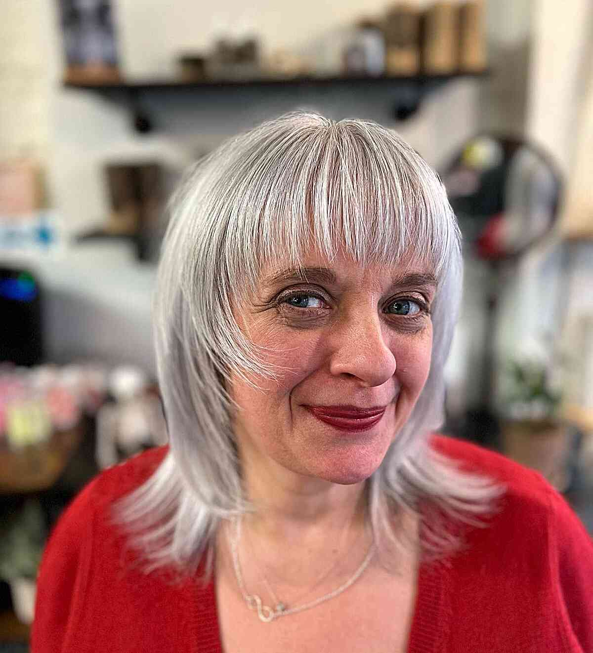 Layered Shaggy Wolf Cut with Wispy Bangs for older women with very thin hair