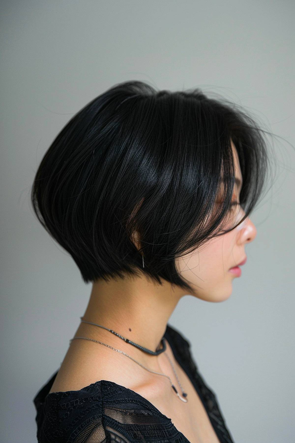 Sleek layered stacked bob with angled front