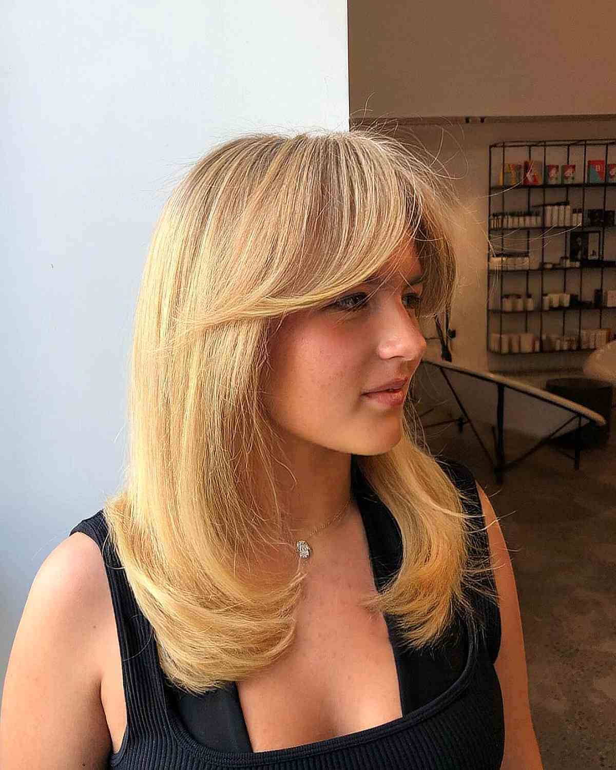 Layered Straight Hair with Long Curtain Bangs