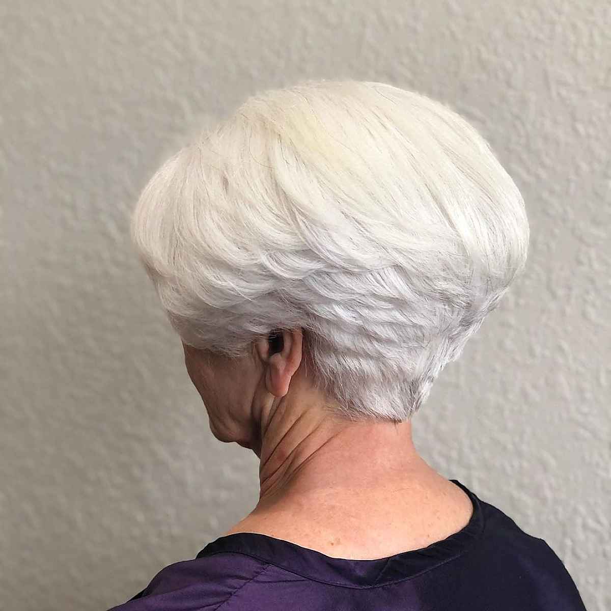 Layered wedge haircut for ladies over 60 with thick hair