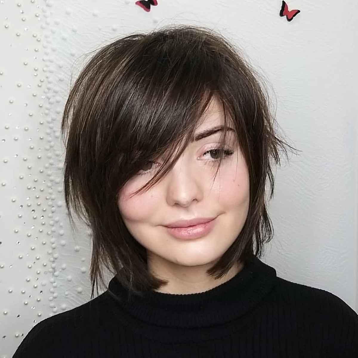 Layered Wolf Haircut with Side-Swept Bangs