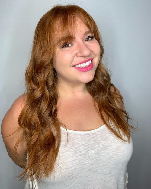 A light and wispy bangs on long hair and round faces