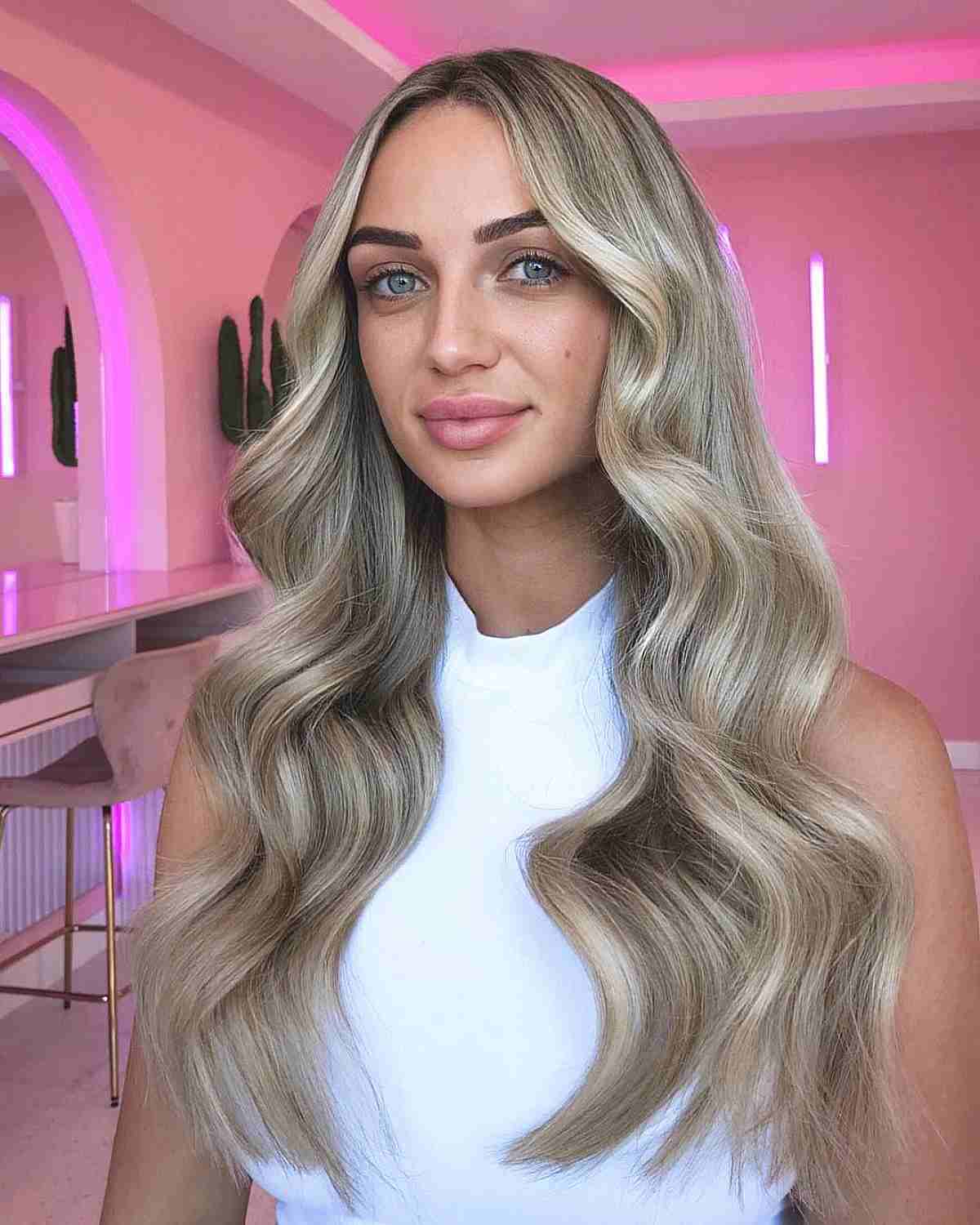 Light Ashy Blonde Tones on Long Middle Part Hair