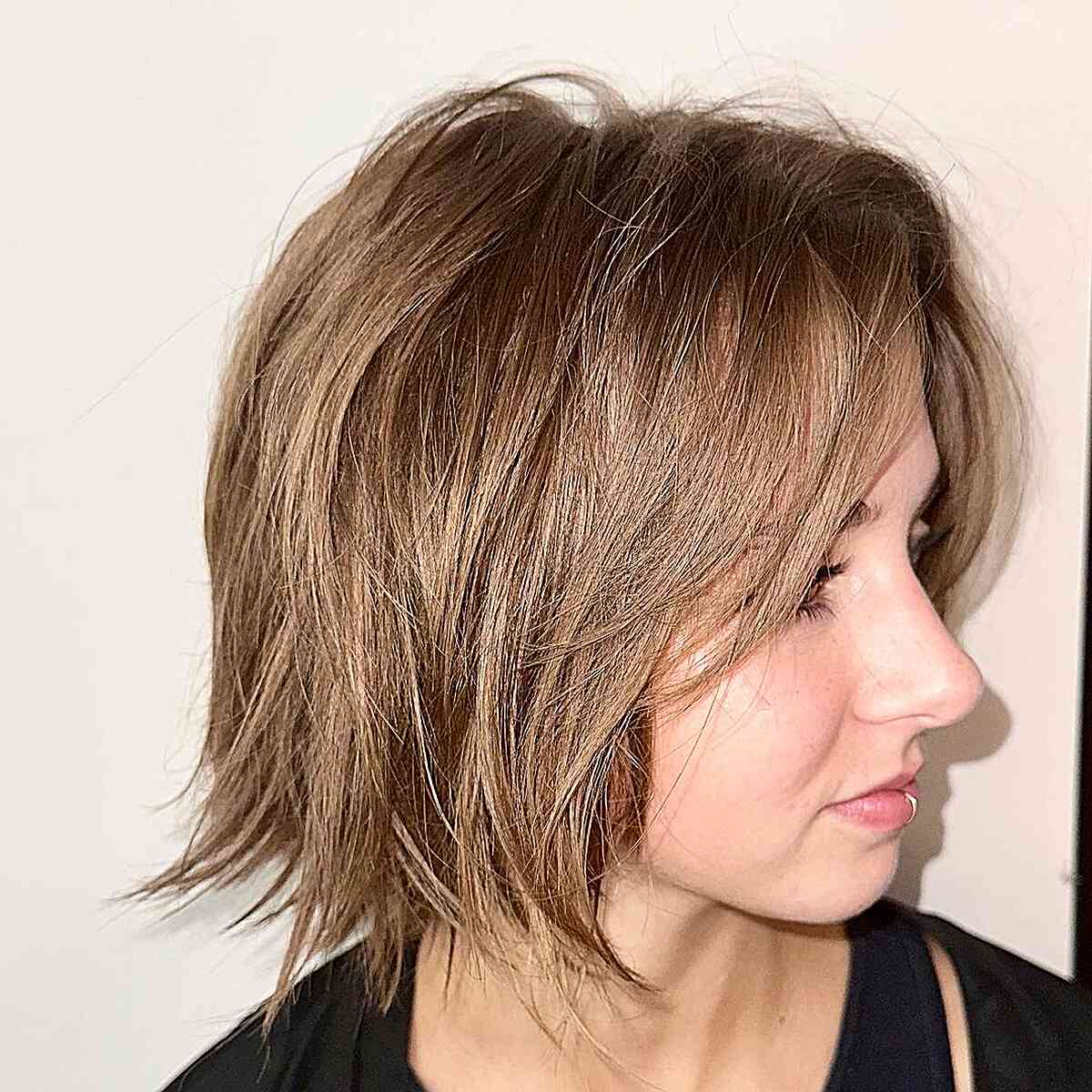 Chin-Grazing Light Brown Bob with Textured Choppy Ends and Bangs