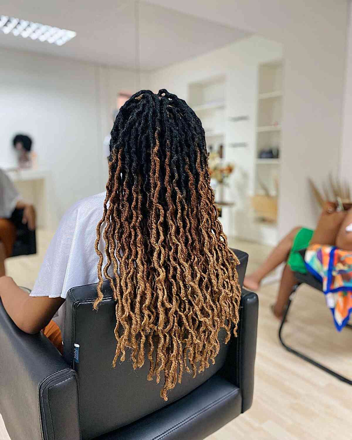Light Brown Goddess Faux Locs Hairstyle