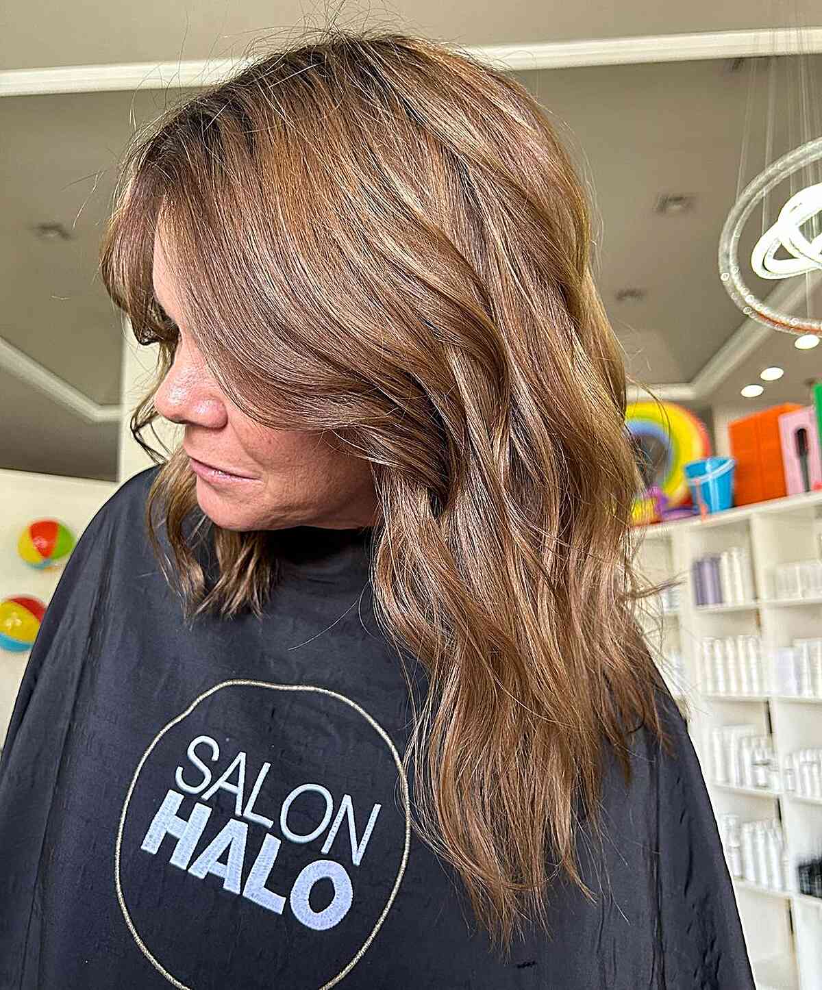 Mid-length Light Brown Hair with Textured Ends for 60-year-old Women