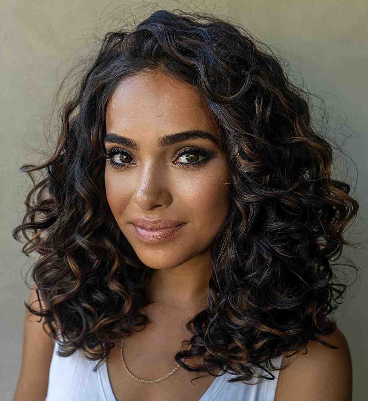 Light Brown Highlights on Dark Black Curly Hair