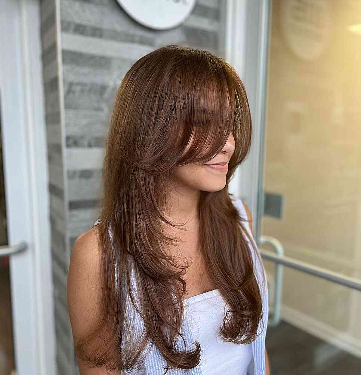 Light Brown Thin Hair with Long Bangs and Layers