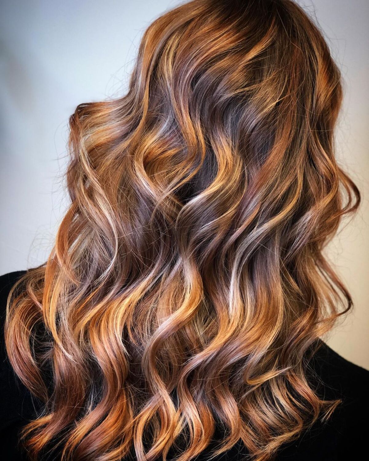 Light Copper Blonde Highlights on Dark Hair