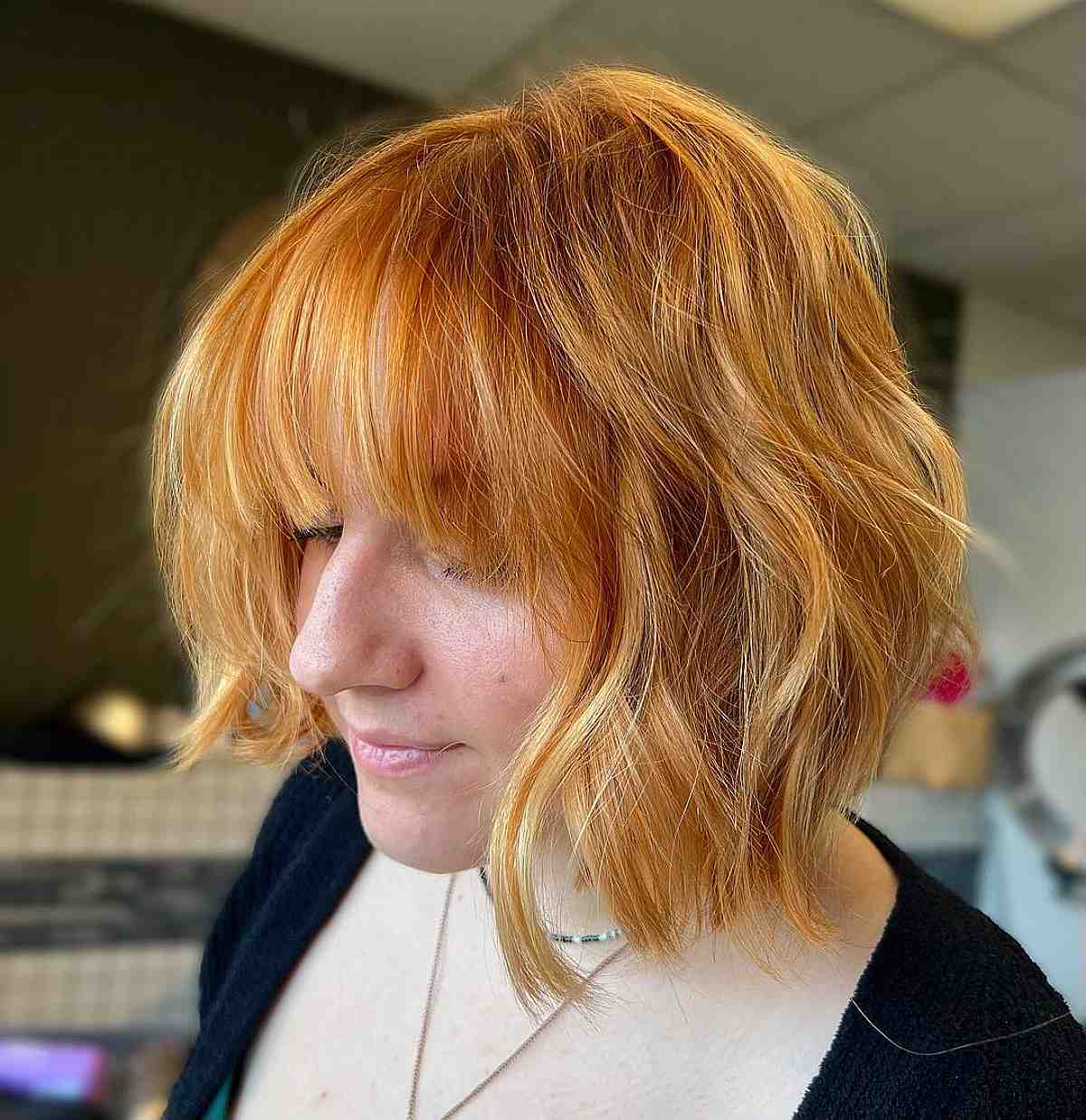 Light Copper on a Textured Choppy Bob with Bangs
