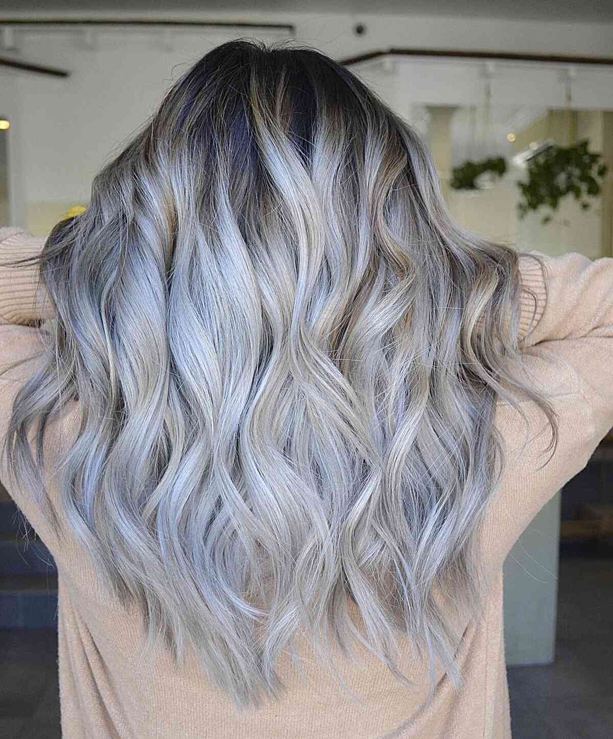Medium-Long Hair with Light Smokey Grey Ice Blonde Balayage and Dark Base Color Styled with Thick Waves