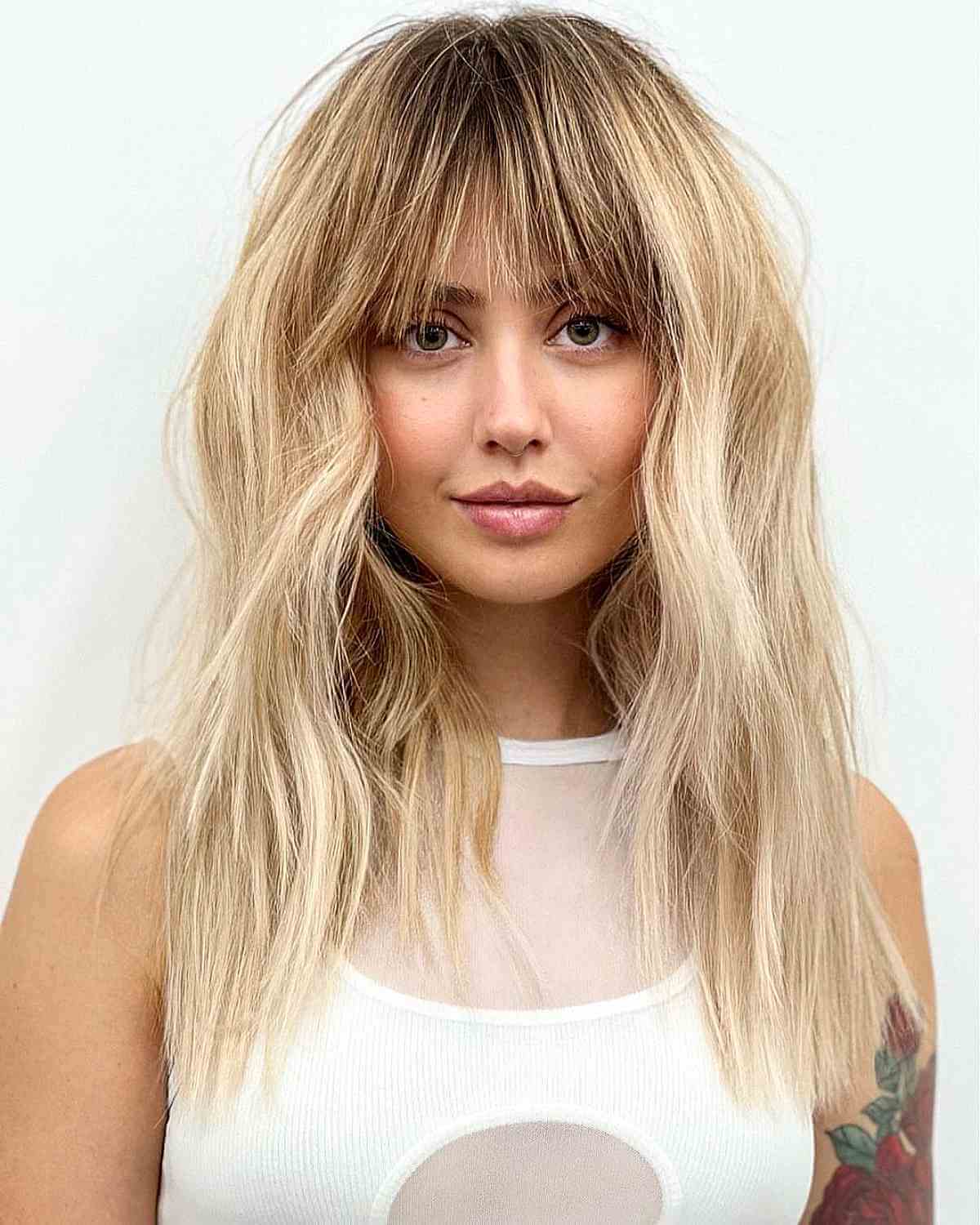 Lived-In Blonde Shag with Jagged Bangs
