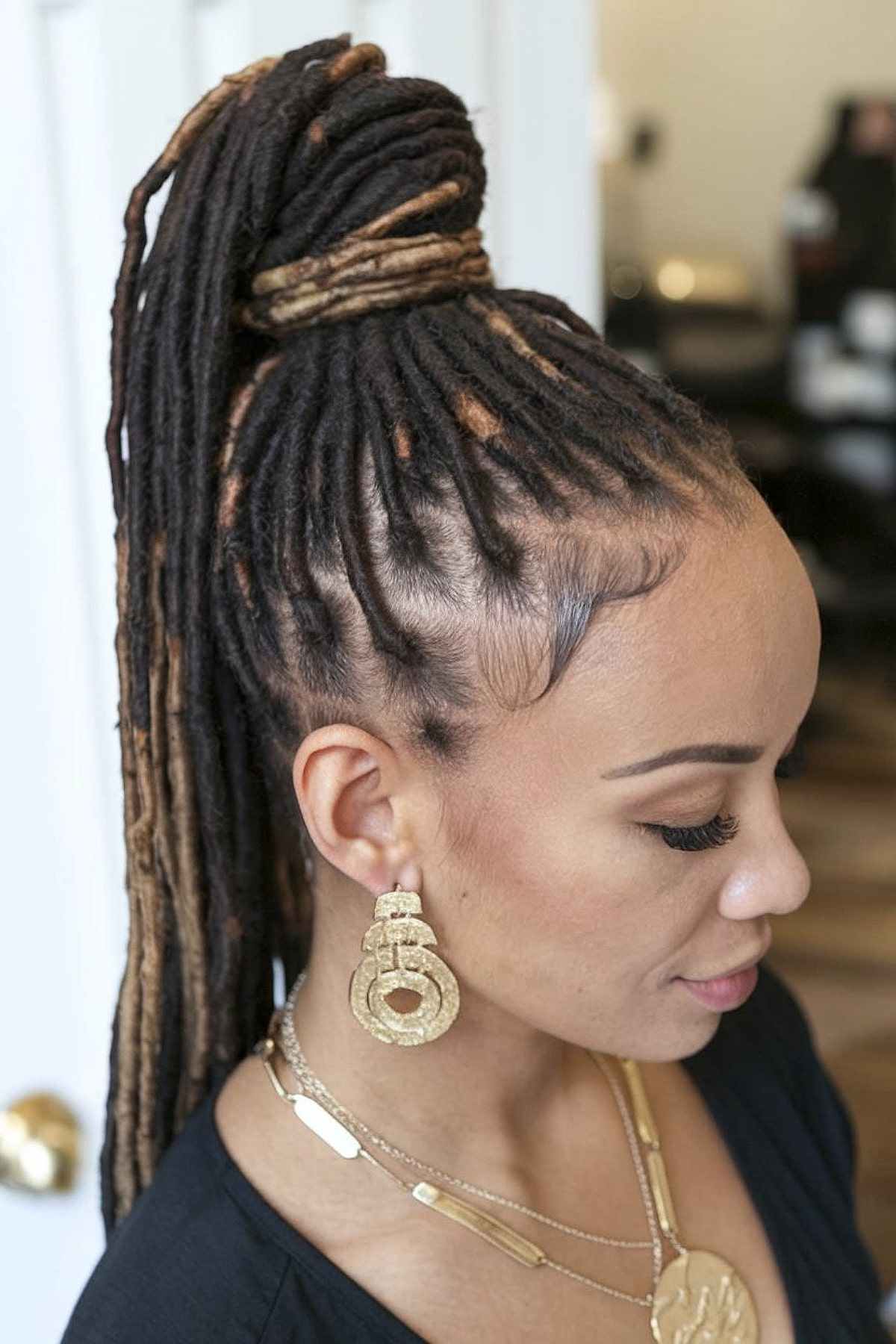 High ponytail with wrapped locs for homecoming