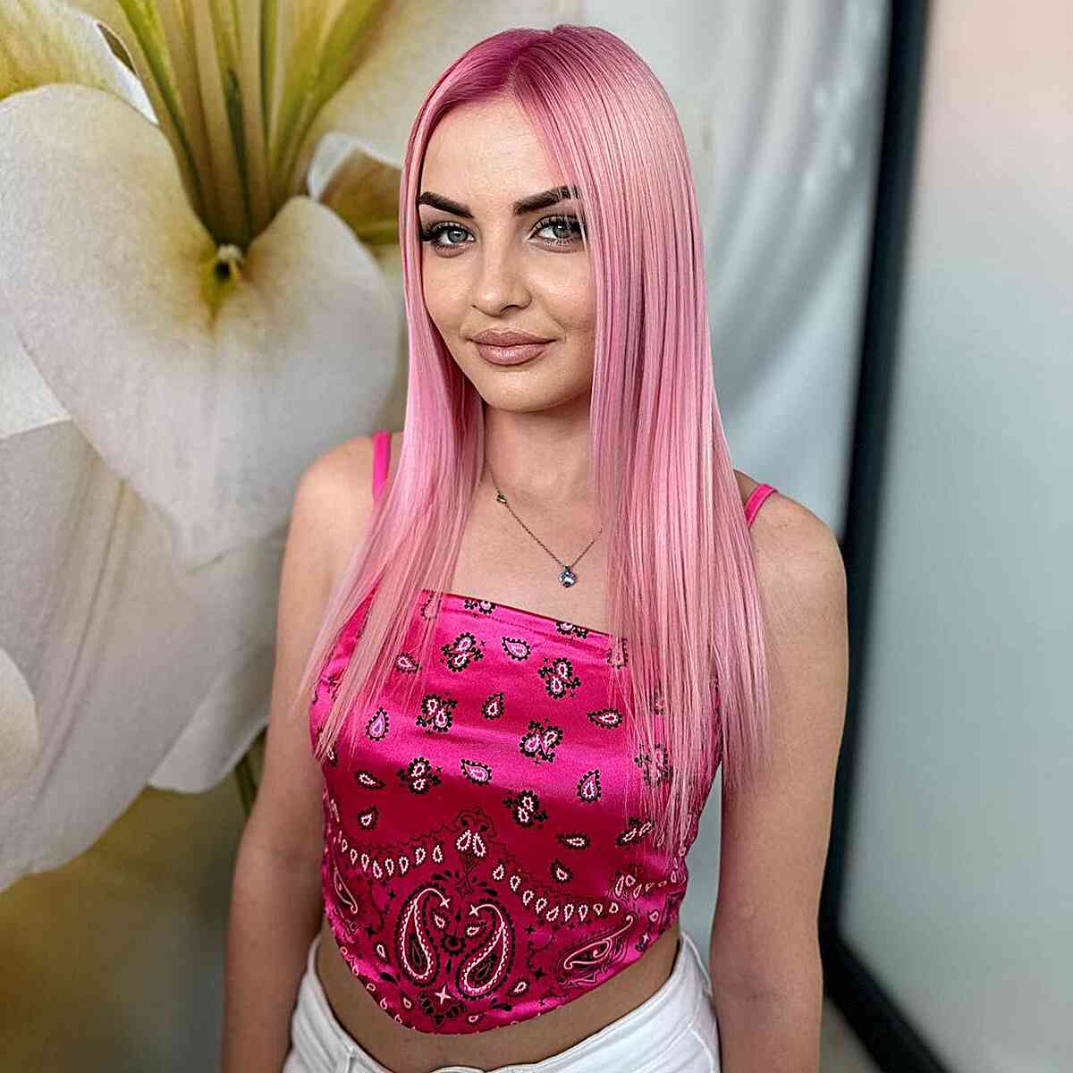 Long and Pink Thin Hairstyle with a middle part