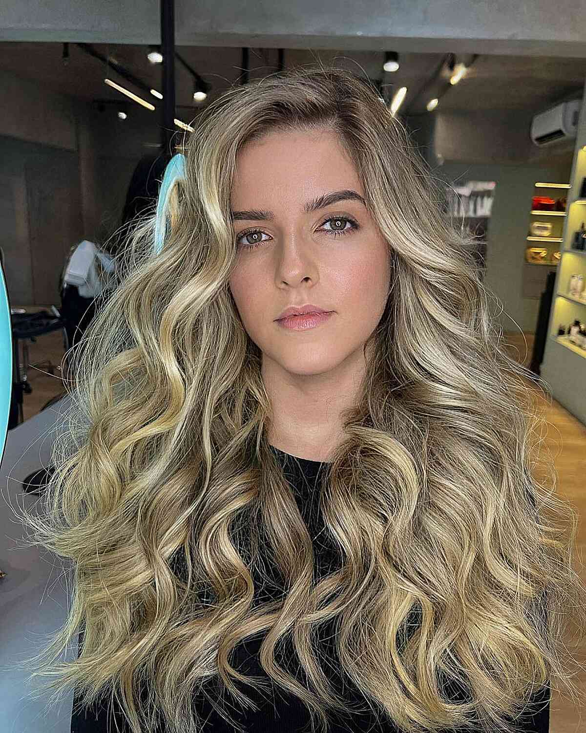 Long and Thick Blonde Loose Wavy Curls with Deep Side Part