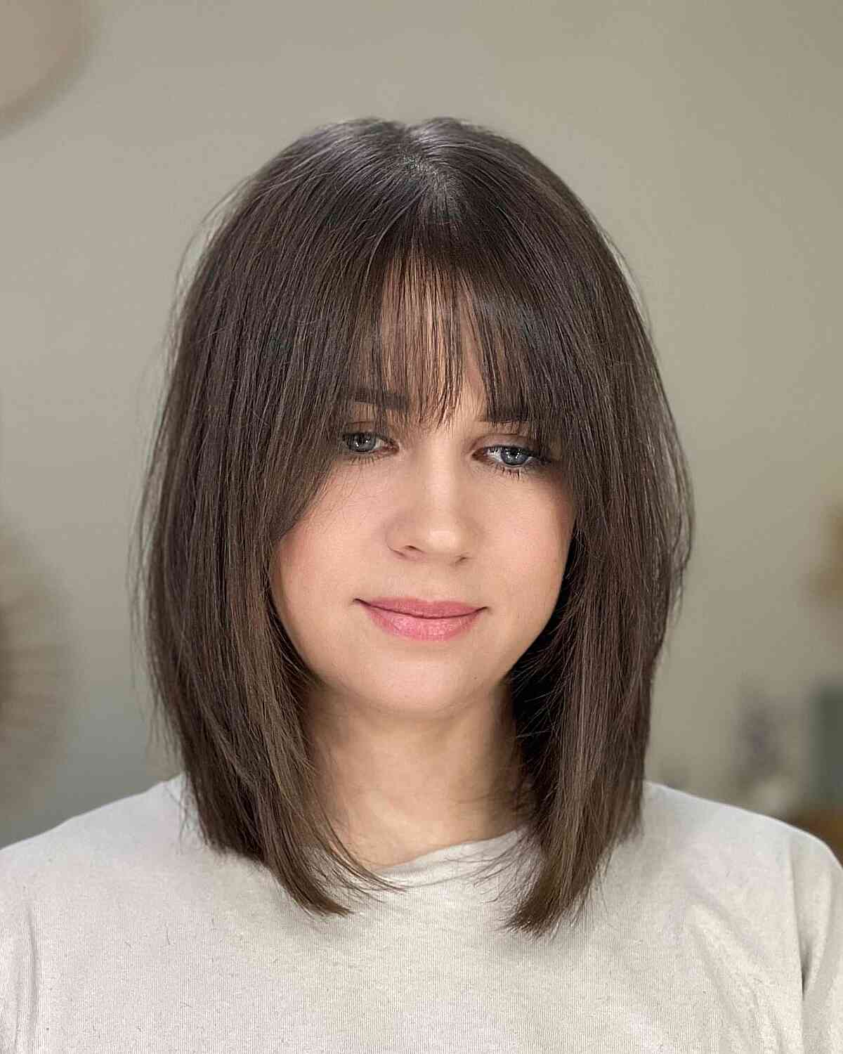 Long Angled Bob with Bangs and Layers for Women