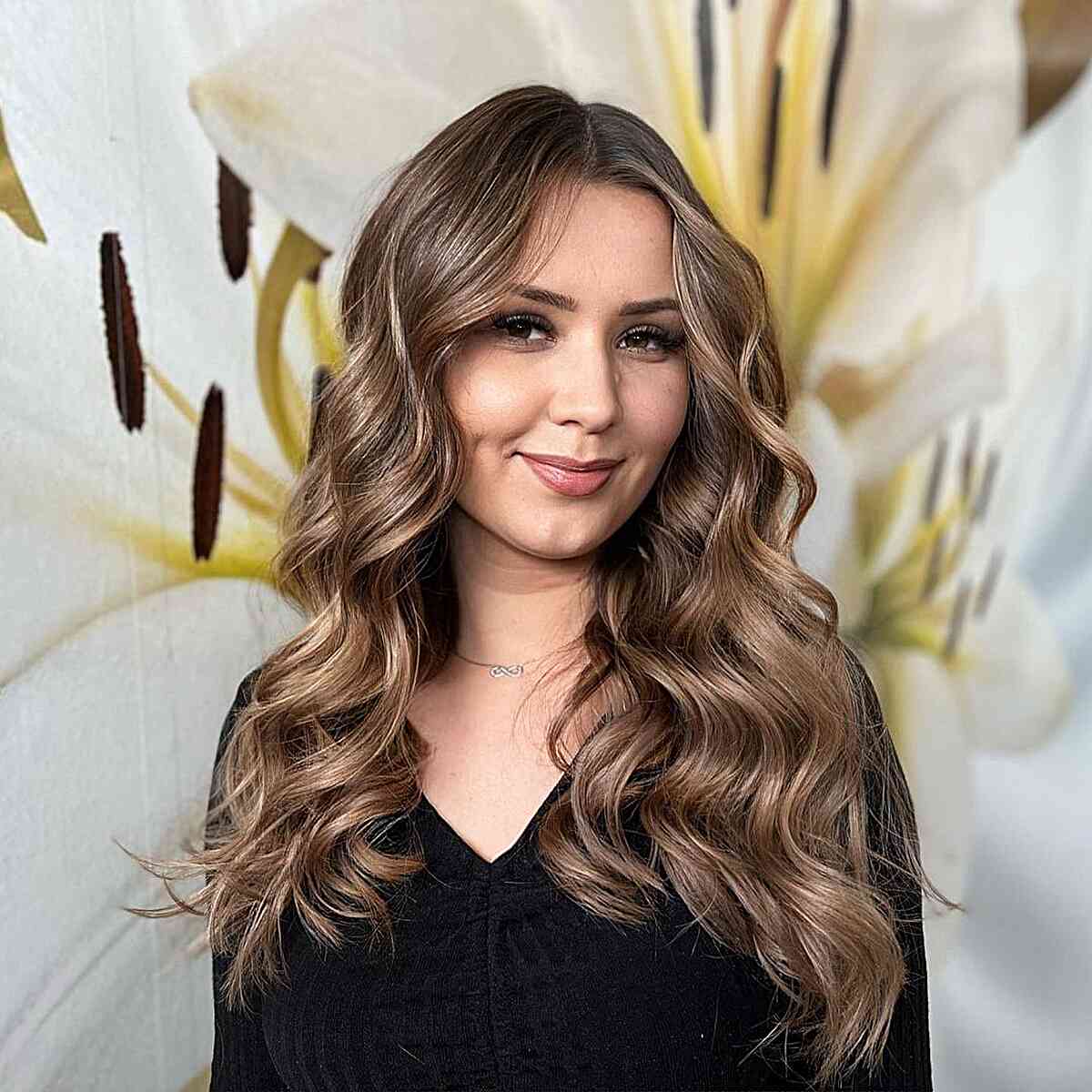 Long Balayage Waves and Middle Part for women with strong cheekbones