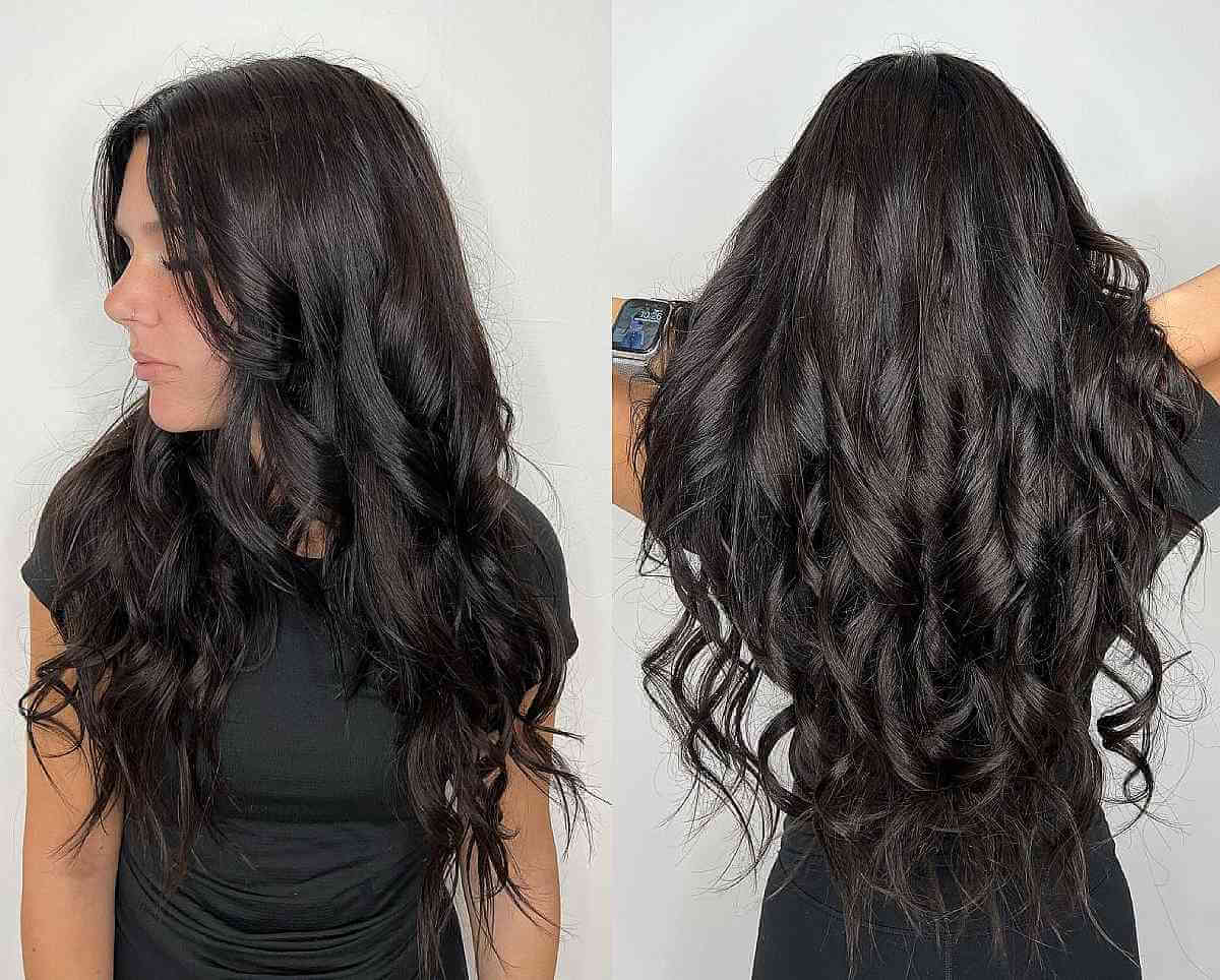 Long black V cut hair with loose curls