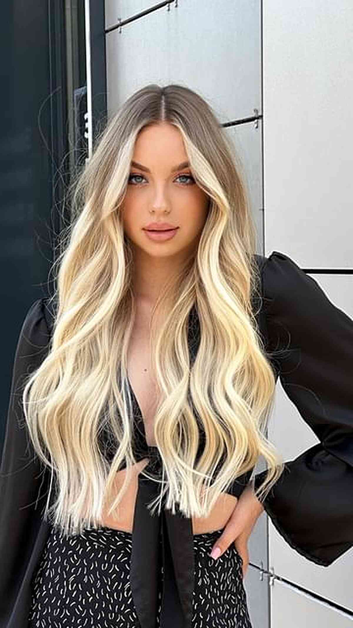 Long Blonde Fine Hair with Blunt Ends and a Center Parting