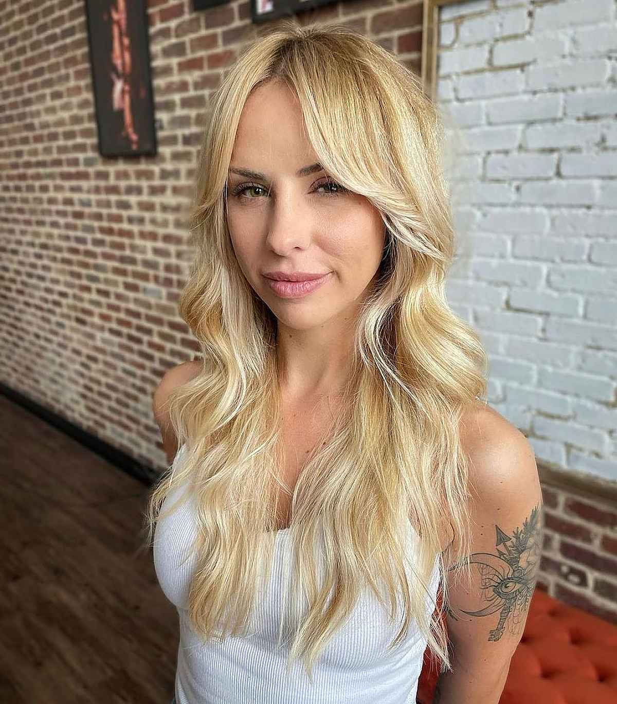 Long Blonde Shag with Middle-Parted Bangs