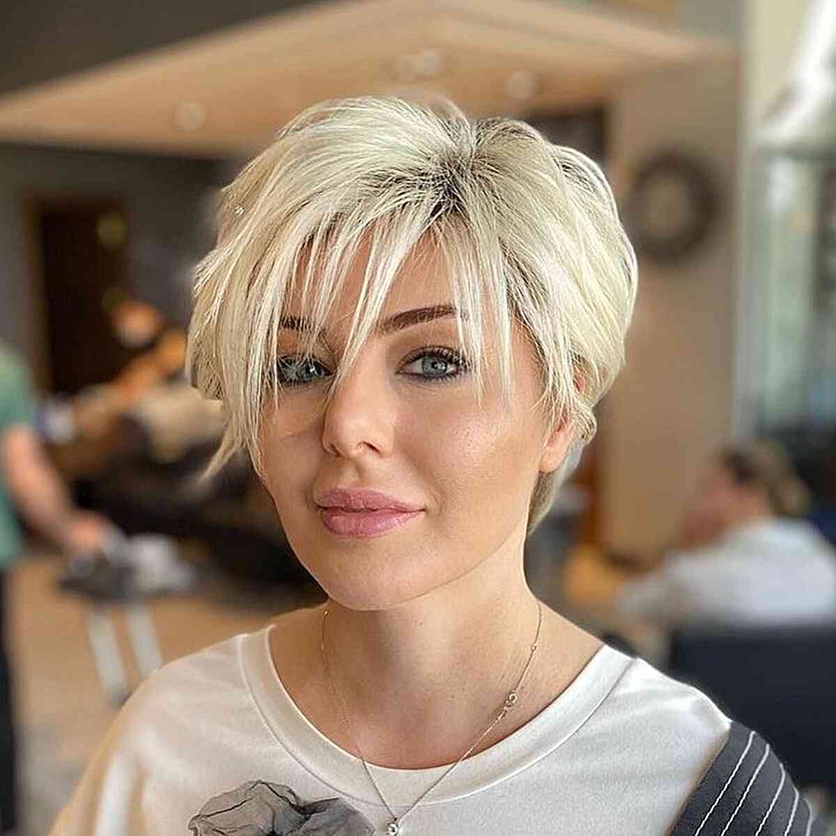 Long Blonde Textured Pixie That's Swept to the Side