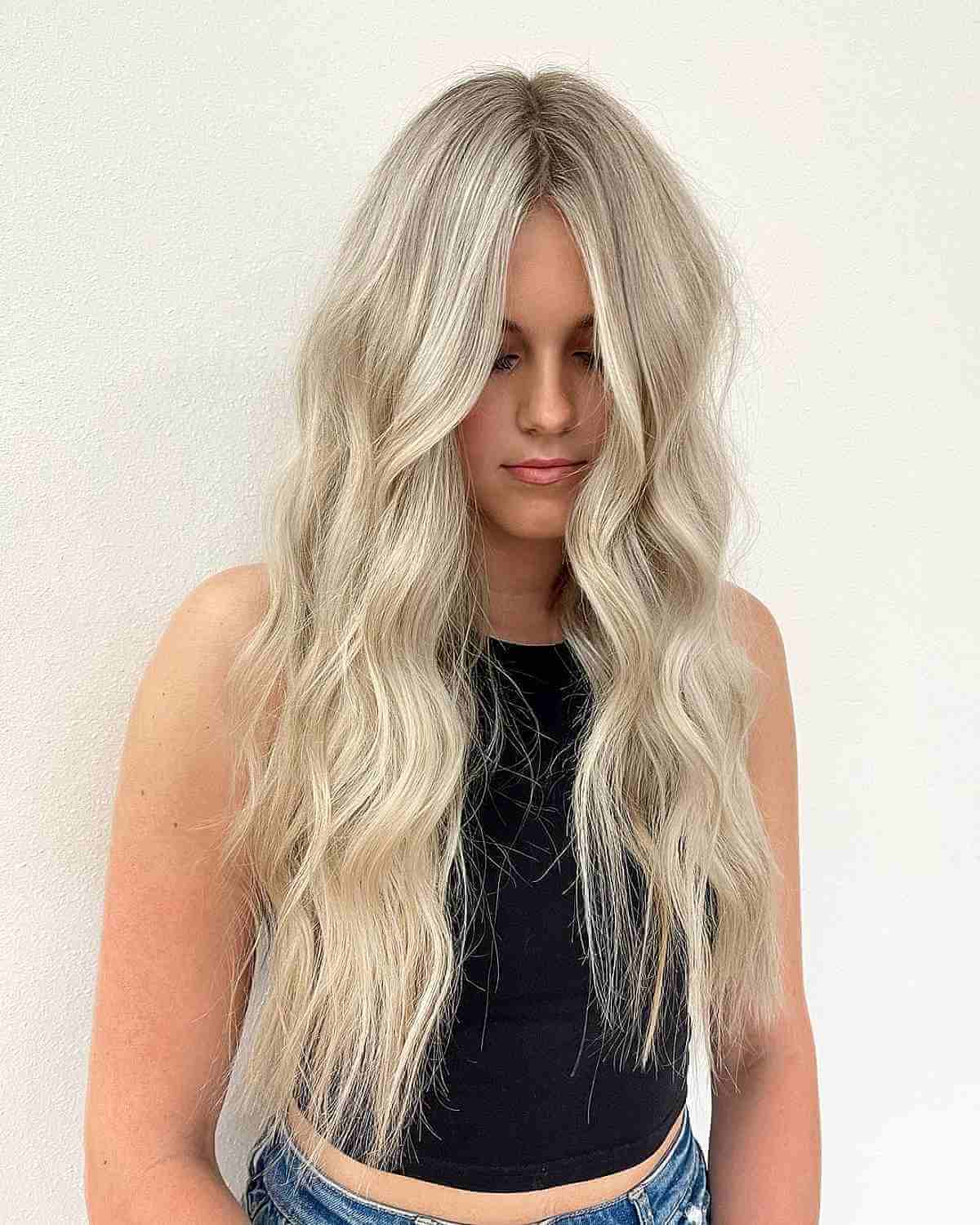 Long Blonde Wavy Hair with a Center Part