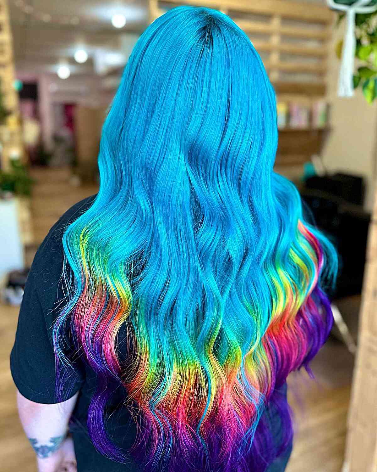Long Blue Hair with Rainbow Tips Hair Color Idea