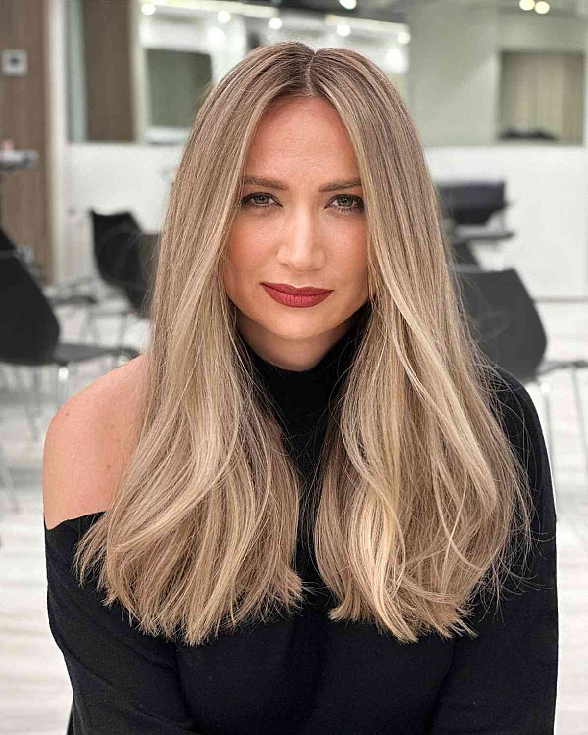 Long Blunt Blonde Balayage with a Center Part for Women with long blonde hair