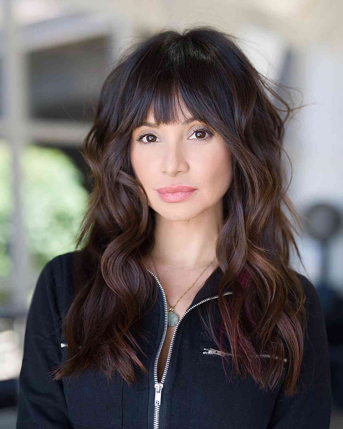 long blunt cut hairstyle with bangs