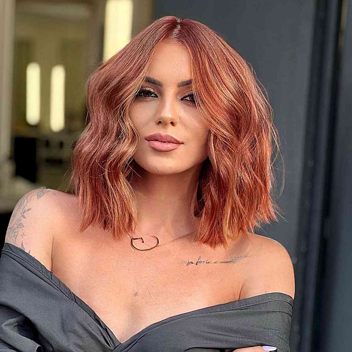Long Blunt Yet Tousled Bob for ladies with auburn colored hair